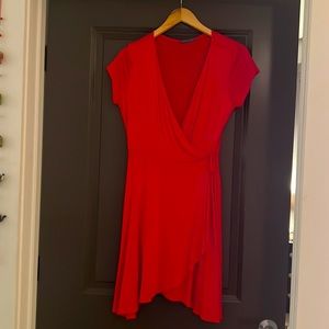 Woman’s red wrap dress
